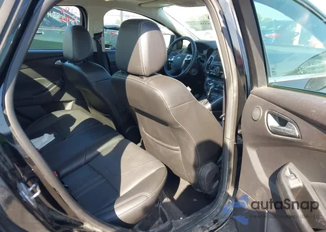 2014 Ford Focus Titanium from USA, damaged, VIN 1FADP3J23EL237429